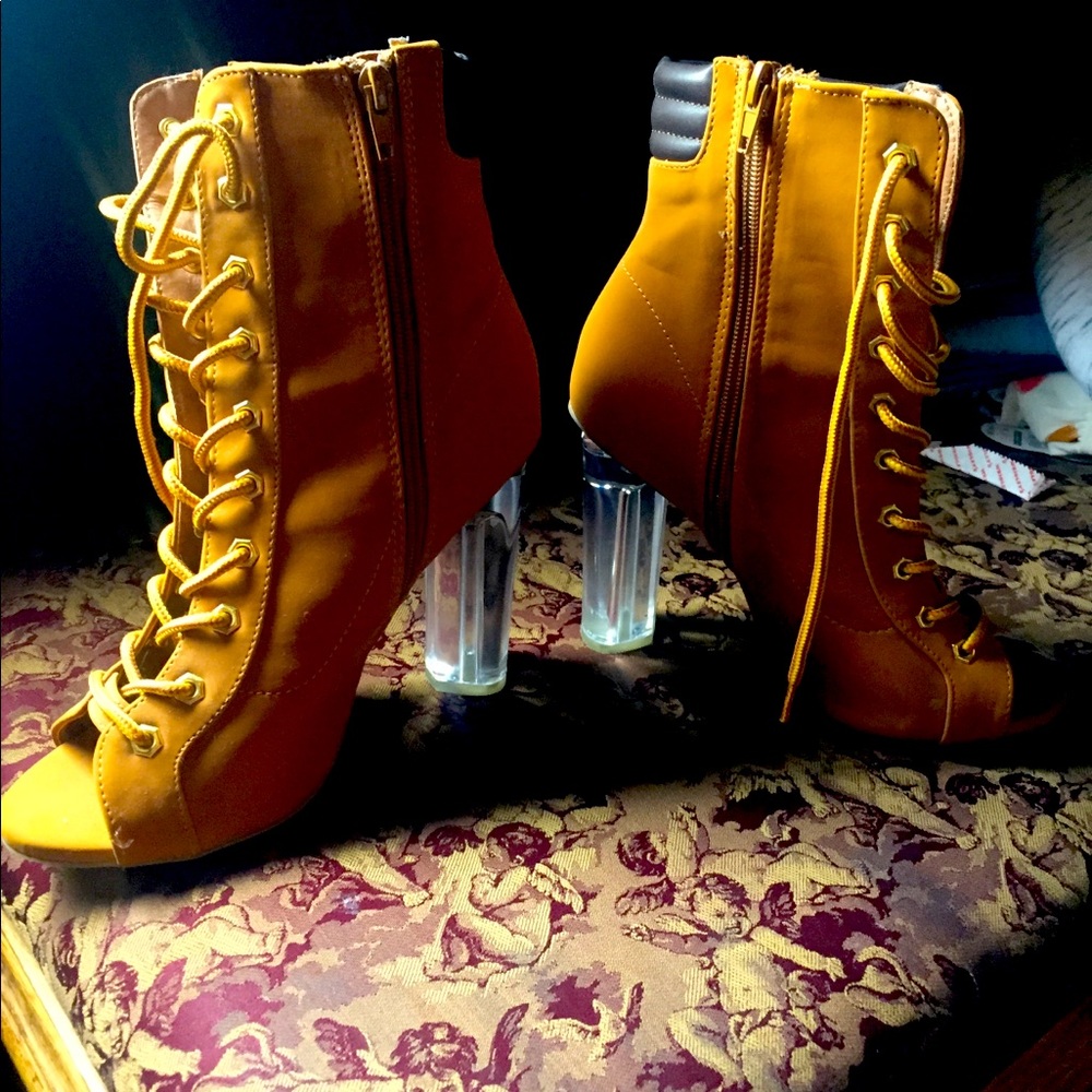 Open toed clear heel boots